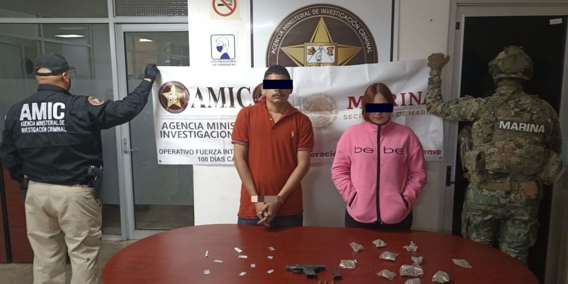 Dos detenidos, narcótico y arma de fuego asegurados en cateo realizado por AMIC y SEMAR