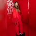 Belinda impone tendencia con elegante traje rojo con plumas
